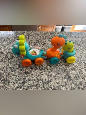 Fisher price Teal & Orange Dino Pull-Along Toy Train - Baby Interactive Toy